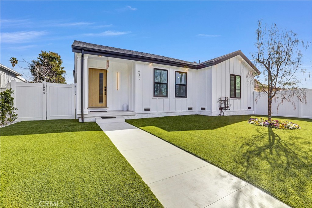 This primary home at 6900 Corbin Ave boasts excellent curb appeal and a completely renovated open-concept design. High ceilings, recessed lighting and new flooring flow throughout, creating a bright and welcoming atmosphere. The spacious living room is filled with natural light, while the sleek, neutral-toned kitchen features ample cabinetry, generous counter space, brand-new stainless steel appliances, a stylish island, and an adjacent dining area as well as access to a beautifully landscaped backyard, ideal for hosting or relaxing. Central air and heating ensure year-round comfort.