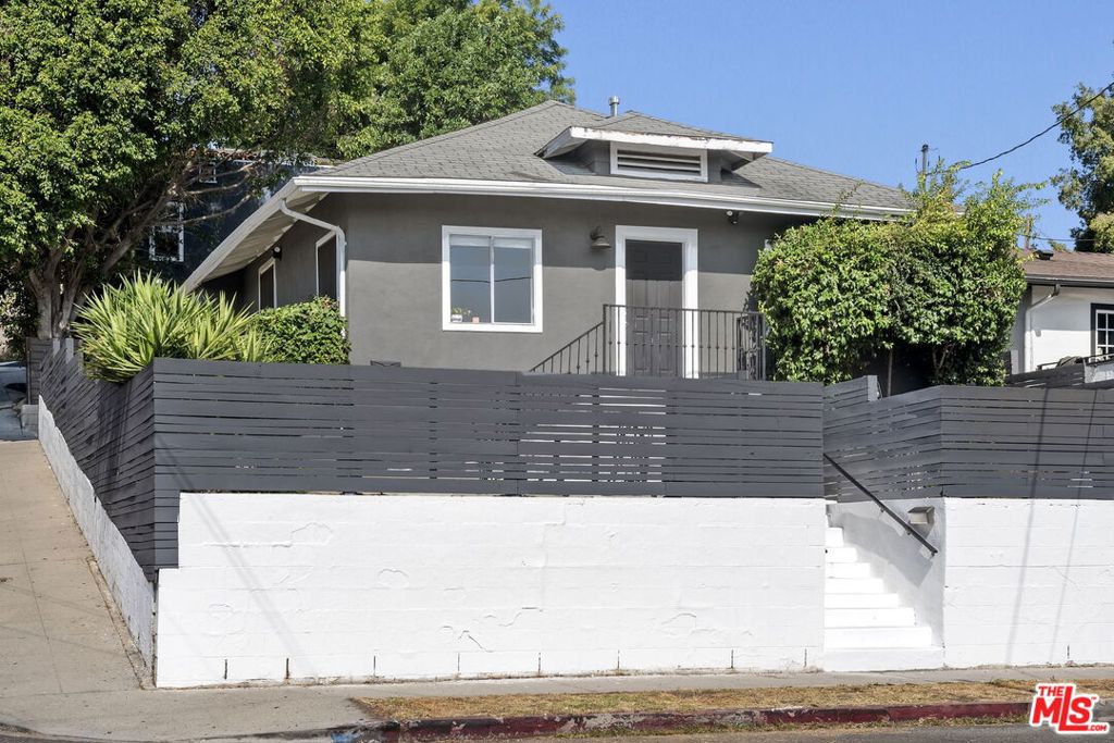Presenting a unique opportunity to own two distinct homes with independent driveways on a corner lot situated in Highland Park between York and Figueroa. This charming DUPLEX property offers privacy and convenience, each with its own character and appeal. 5375 Raphael St. is a cozy 2-bedroom, 1- bath home facing Raphael St. and offers a perfect blend of comfort and functionality. Nestled in a prime location, it boasts a charming facade, bright interiors, and a functional layout ideal for small families or as an investment property. The home is complemented by a private driveway for two to three vehicles plus a garage which has been soundproofed and modified for use as a rehearsal space. 703 N. Ave 54, the spacious 3-bedroom, 2-bathroom home features generous living areas, an updated kitchen, and yard space perfect for entertaining. It too enjoys the benefit of its own private driveway off Raphael St, ensuring a sense of independence while being close to everything the area has to offer. Both homes feel entirely separate, making them perfect for multi-generational living, rental income, or just having the space to spread out. With two driveways and independent entrances, the layout promotes a strong sense of privacy. Don't miss out on the chance to own two fantastic properties with distinct appeal. An ideal investment or family compound.