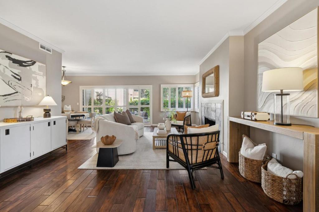 Welcome to 1328 Woodside Road, a modern oasis in Redwood City. This contemporary 2-bedroom, 2-bathroom condo is a well-designed living space. Enter into a bright and airy living room, complete with a cozy gas fireplace. The dining room adjacent to the patio creates a seamless indoor-outdoor flow, perfect for entertaining. In-unit laundry completes this functional and stylish home. Adjacent to the entryway, you'll find a versatile office space. The primary suite ensures comfort and privacy, while the hall bath serves guests and the second bedroom. Both bedrooms open onto a rear patio with additional gardening space. A large storage closet at the front patio and additional storage at the carport provide ample space. The community offers a rec room and pool. Easy access to SFO, San José Mineta International Airport, Highways 101 & 280. It's a short distance to vibrant downtown Redood City & a quick walk to the Woodside Plaza shops. Welcome Home!