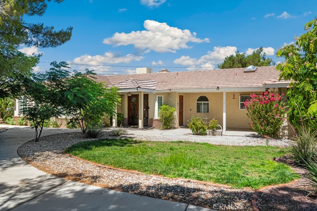 Spacious and light-filled, this 3-bedroom, 2-bath home offers 2,208 sq ft of well-designed living space on a large corner lot. The flexible layout includes a formal living room and a separate family room—perfect for both everyday comfort and entertaining. The generous primary suite features a versatile bonus space ideal for a home office or gym, along with an ensuite bath complete with double sinks and a sunken soaking tub. Enjoy the expansive backyard with endless potential, plus a large front yard with custom hardscaping and a circular driveway offering ample off-street parking for multiple cars. A 3-car attached garage provides additional convenience. Situated in a desirable neighborhood close to parks, schools, and shopping, this home delivers the perfect blend of space, function, and curb appeal.