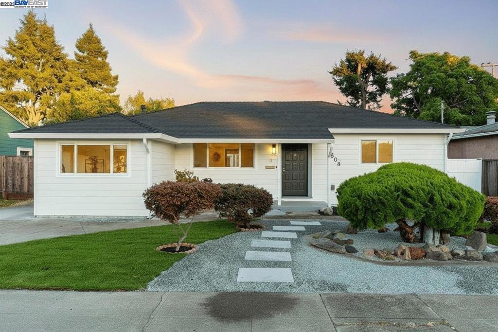 Welcome to 1508 141st Avenue, a beautifully updated home in the heart of San Leandro! This charming property features a thoughtfully remodeled kitchen with sleek countertops, modern cabinetry, and stainless steel appliances—perfect for any home chef. The bathroom has also been tastefully renovated, offering a fresh and contemporary design for your comfort. Enjoy peace of mind with brand-new electrical throughout the home, ensuring safety and efficiency for years to come. Inside, the bright and airy living spaces are filled with natural light, creating a warm and inviting atmosphere. The functional layout makes this home ideal for both everyday living and entertaining guests. Step outside to a spacious backyard, perfect for outdoor gatherings, gardening, or simply relaxing in your own private retreat. The large lot also includes a detached two-car garage, providing ample storage and parking options. There’s even potential for an ADU or workshop—endless possibilities await! Conveniently located near major highways, schools, parks, shopping, and dining, this home offers the perfect blend of comfort and convenience. Whether you're a first-time buyer or looking to upgrade, this home delivers modern updates and timeless charm in one incredible package. A Must See!