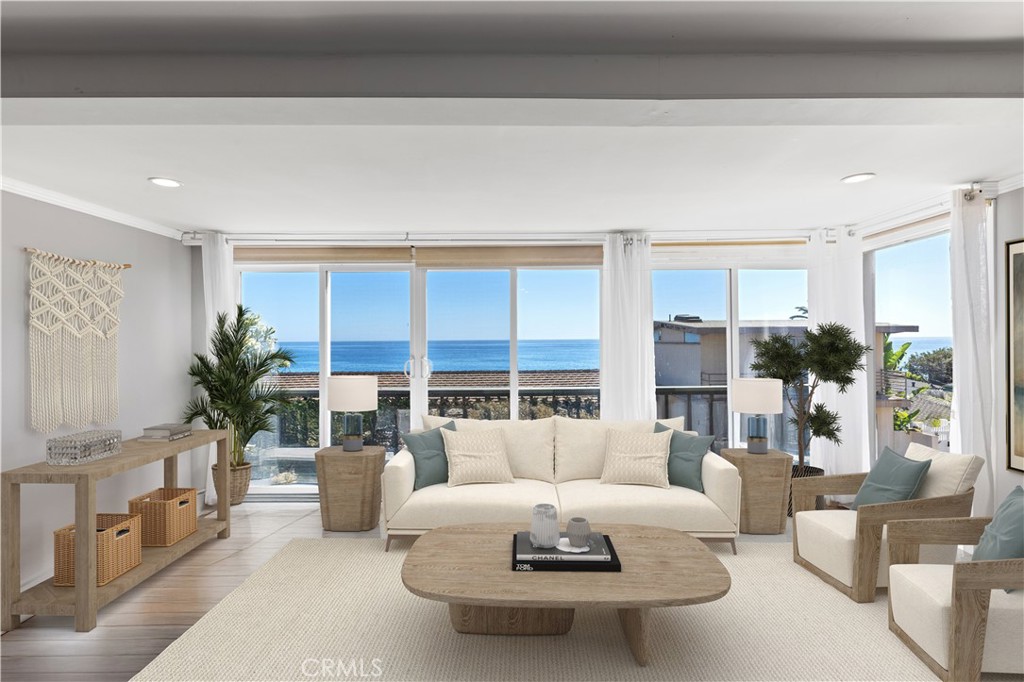 Moments from the sands of Victoria Beach in South Laguna, this four-bedroom, three-bath property features a main home and a detached cottage, offering exceptional versatility in a coveted coastal setting. Positioned near one of Laguna’s most iconic stretches of shoreline, it combines breathtaking surroundings with the flexibility to accommodate a variety of lifestyles.
The top level of the main home showcases expansive windows and a private balcony perfectly positioned to capture sweeping views of the Pacific and Catalina Island. With two bedrooms, one bath, and a fireplace, this light-filled retreat is designed to fully embrace its stunning coastal setting. The lower level includes one bedroom, one bath, and a loft, while the detached cottage offers another bedroom and bath, complete with a private stone patio and deck for a secluded escape.
Complete with full kitchens and living areas, the three independent living spaces are thoughtfully designed to accommodate relatives, guests, or rental opportunities, offering privacy and flexibility for a variety of needs. Throughout the spaces, open-beam ceilings add character and warmth, while two single-car garages provide convenience and valuable parking.
This unique configuration presents a rare opportunity to reimagine the property as a spacious single-family residence, create a multi-generational retreat, or enjoy the penthouse level as your private coastal haven while generating income from the other two spaces.
Just a short distance from the Montage Resort, popular restaurants, and Laguna’s vibrant galleries and boutiques, this home offers the chance to live the iconic Victoria Beach lifestyle—whether as a primary residence, a family getaway, or a unique blend of personal use and investment potential.