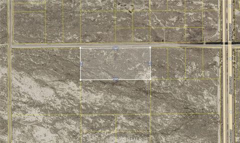 Photo of 2500 W Avenue C, Lancaster, CA 93536 (MLS # SR26037205)