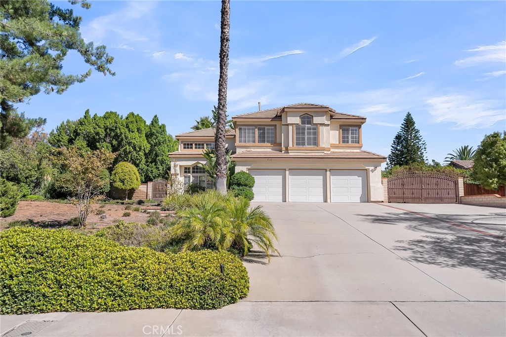 Welcome to this stunning residence tucked inside Riverside’s highly sought after Mission Grove community. Set on nearly an acre lot, the home offers a timeless traditional layout with elegant formal living and dining rooms, spacious gathering areas, and the convenience of a downstairs bedroom and full bath, ideal for guests or multi-generational living. Recent updates bring peace of mind, including a newer roof and upgraded A/C. Upstairs, the primary suite is a beautifully remodeled bathroom and a private balcony capturing breathtaking sunset views. Step outside to your personal backyard oasis, an expansive 45x22 pool with beach entry, diving board, and lap lane option, all surrounded by a luscious backyard with RV parking. Blending thoughtful updates, a versatile floor plan, this Mission Grove home delivers the perfect balance of comfort, charm, and lifestyle.