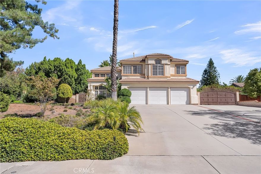Welcome to this stunning residence tucked inside Riverside’s highly sought after Mission Grove community. Set on nearly an acre lot, the home offers a timeless traditional layout with elegant formal living and dining rooms, spacious gathering areas, and the convenience of a downstairs bedroom and full bath, ideal for guests or multi-generational living. Recent updates bring peace of mind, including a newer roof and upgraded A/C. Upstairs, the primary suite is a beautifully remodeled bathroom and a private balcony capturing breathtaking sunset views. Step outside to your personal backyard oasis, an expansive 45x22 pool with beach entry, diving board, and lap lane option, all surrounded by a luscious backyard with RV parking. Blending thoughtful updates, a versatile floor plan, this Mission Grove home delivers the perfect balance of comfort, charm, and lifestyle.