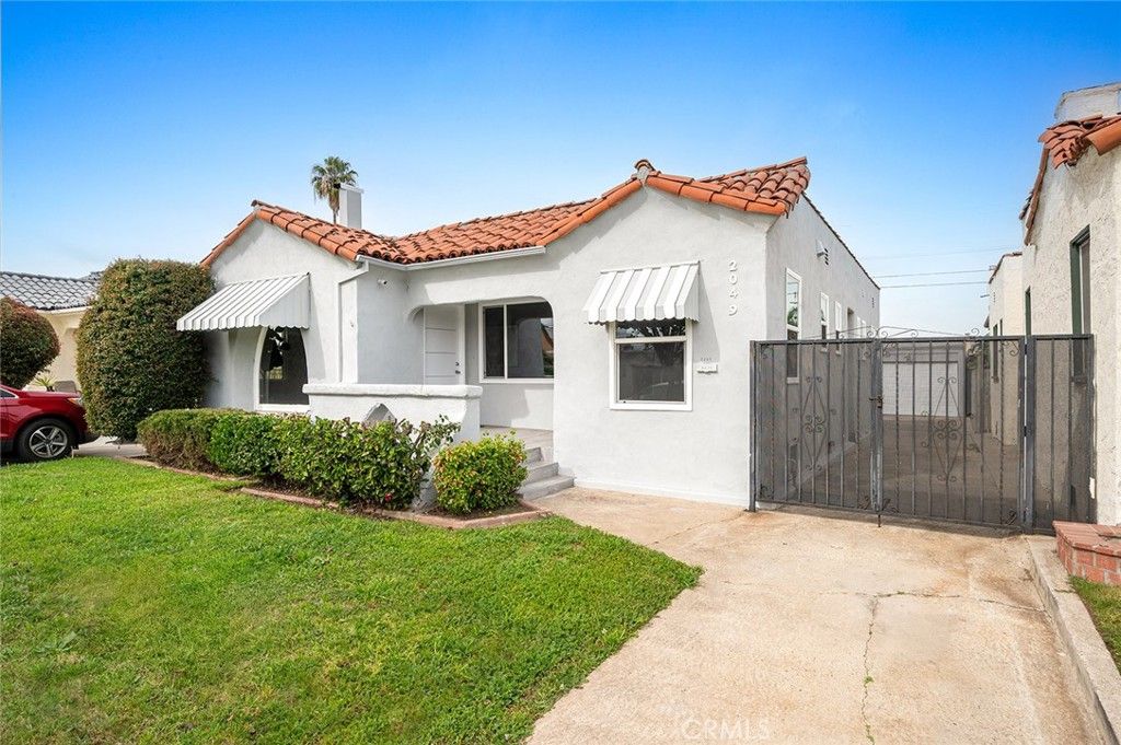 Photo of 2049 W 71St Street, Los Angeles, CA 90047 (MLS # DW26025897)