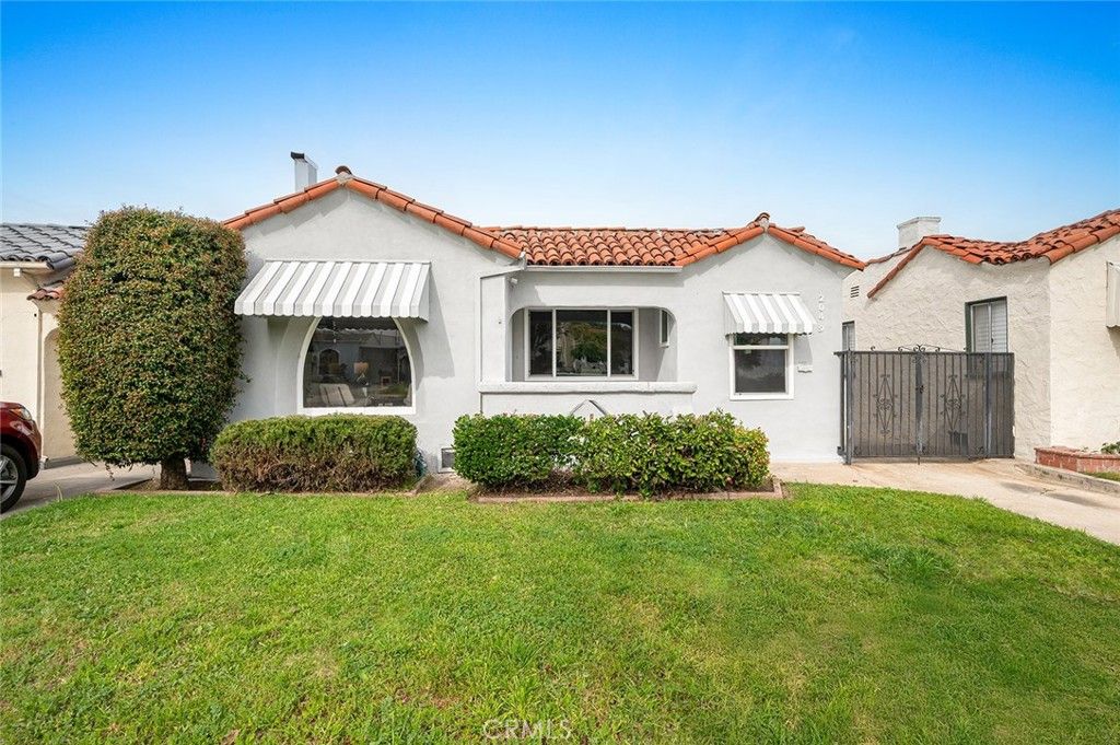 Photo of 2049 W 71St Street, Los Angeles, CA 90047 (MLS # DW26025897)