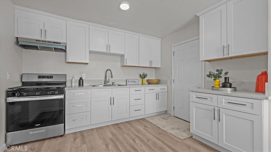 Welcome to 242 E 6th St, Perris, CA! This beautifully renovated single-story home offers comfort, style, and convenience. Recent upgrades include a new roof, new dual pane windows, new flooring, fresh interior and exterior paint, and fully remodeled kitchen and bathrooms. The open and inviting layout is perfect for everyday living, featuring bright natural light and a modern feel throughout. Sitting on a spacious lot with ADU potential, this property provides endless opportunities—ideal for adding a guest house, rental unit, or multi-generational living. Located just minutes from the 215 freeway, shopping, dining, and schools, this home is perfect for commuters and families alike. With all major renovations already done, all that’s left is to move in and make it your own!