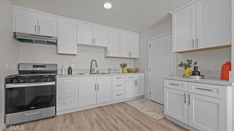 Photo of 242 E 6th St, Perris, CA 92570 (MLS # IG25248713) Photo of 242 E 6th St, Perris, CA 92570 (MLS # IG25248713)