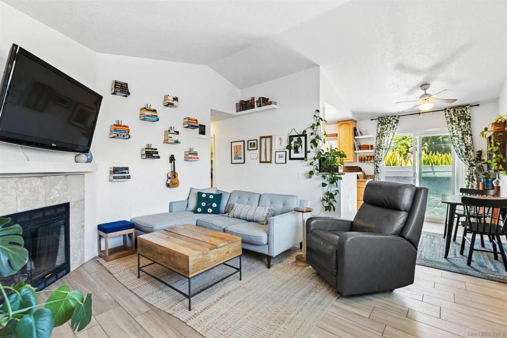 Stylish Condo Living in the Heart of San Diego! Located at the convergence of three of San Diego’s most walkable neighborhoods, this chic condo is truly a walker’s paradise! Abundant natural light, open layout design, and vaulted ceilings give this home a spacious, welcoming feel from the moment you step inside. The updated kitchen boasts granite countertops, ample prep and storage space, and modern stainless steel appliances including double oven and ceramic cooktop. Outside the dining area sliding glass door, your private west-facing balcony is perfect for enjoying morning coffee or evening sunsets, or your own personal herb garden. Durable, low-maintenance tile flooring throughout creates continuity, and dual-pane windows and a master bedroom mini split ensure comfort year-round. The private single car garage plus extra designated parking space solves city living’s biggest challenge, while entry gates and on-site laundry add convenience and peace of mind. Outstanding walkability means this area is brimming with restaurants, coffee shops, boutiques, artist’s studios, and live entertainment, including University Heights Business District, Trolley Barn Park, Hillcrest Farmers Market, and Balboa Park/Morley Field sports complex, dog park, playground, picnic areas, and hiking trails, plus the world-famous San Diego Zoo. This isn’t just a home, it’s the perfect blend of the San Diego lifestyle – modern comfort, urban convenience, and neighborhood charm – all wrapped into one irresistible package!