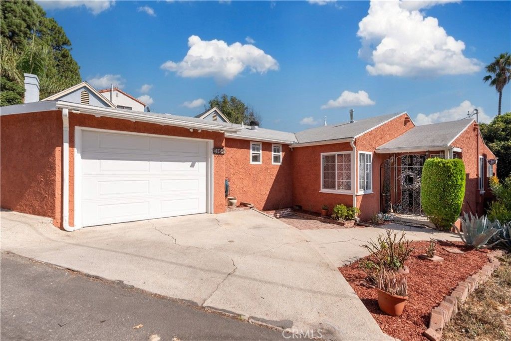 Photo of 6154 Mount Angelus Drive, Highland Park, CA 90042 (MLS # GD25235834)