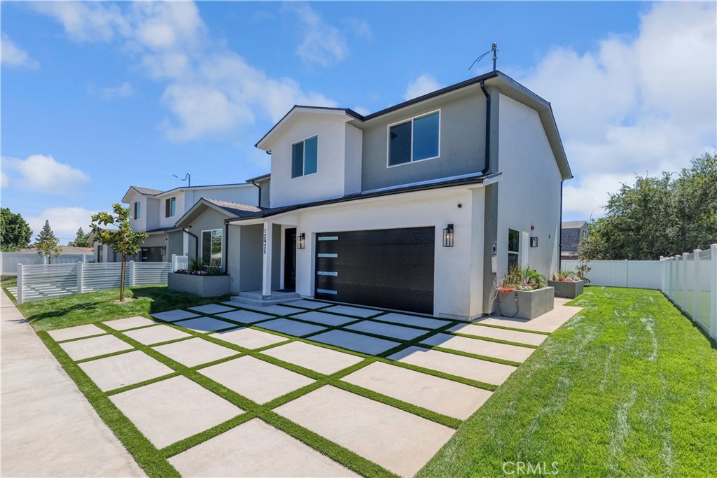 New Construction! Welcome to this immaculate 5-bedroom, 3-bathroom home offering 2,545 sq. ft. of stylish living space. Perfectly located with convenient access to the 5, 405, 210, and 118 freeways. Step inside and be captivated by the open floor plan, soaring high ceilings, and abundant natural light. Designer engineered wood flooring flows seamlessly throughout the home, while a striking dark wood accent wall in the living room adds a bold, modern touch. The gourmet kitchen is a true showstopper, featuring: Quartz countertops ¦Stainless steel appliances ¦Sleek white cabinetry with black hardware ¦Gold-accented light fixtures ¦A unique honeycomb wine bar—ideal for entertaining. The custom steel front door makes a dramatic entrance, and every finish throughout the home has been thoughtfully selected to embody modern elegance and comfort. Outside, enjoy your private landscaped backyard with lush new grass and a dedicated patio area—perfect for al fresco dining or quiet evenings under the stars. A two-car garage offers convenience and extra storage. Located in the sought-after community of Sylmar, this home offers the perfect blend of style, space, and accessibility. BUILDER INCENTIVES UPON ACCEPTED OFFER. (Plans have be submitted to the city for garage conversion into ADU 1Bedroom 1 Bathroom) Call for more details.