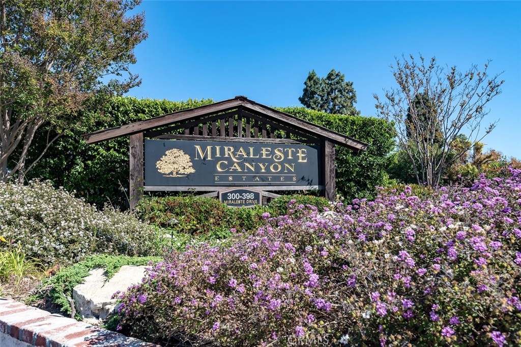 This tastefully upgraded 2 bedroom, 2.5 bath is located in the serene and desirable gated Miraleste Canyon Estates. This meticulous unit has modern upgrades and charm. First floor greets you to living and dining with balcony overlooking the luscious and professionally landscaped greens. Sleekly designed kitchen. A conveniently located powder room completes this floor. Stairs lead you to the second floor. Master bedroom with ensuite upgraded full bathroom. Another bedroom and upgraded bathroom completes this level. 2 assigned parking spots. Community amenities include two pools, spa, recreation room, and security guard. An absolute must see.
