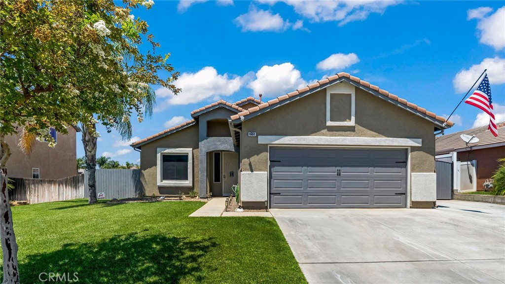 TURNKEY SINGLE STORY 3 Bedroom 2 1/2 Bath Home with AMAZING MOUNTAIN VIEWS! This beauty features a large great room with WET BAR/COFFEE BAR, COZY FIREPLACE open to the upgraded KITCHEN with granite counters, gorgeous backsplash, stainless steel appliances, bar seating and dining area. The PRIMARY Bedroom has it's own FIREPLACE, adjoining PRIMARY Bathroom with separate garden tub and walk in shower, dual sinks and large walk in closet. Large secondary bedrooms, full size hall bathroom and an additional powder room. Indoor laundry, luxury vinyl flooring throughout, freshly painted inside and out, ceiling fans, surround sound entertainment speaker system throughout the home, security door on the entry, NEW AC and so much more. Nicely landscaped front yard, RV Parking with Sewer dump and an entertainers dream backyard with ceiling fans on the COVERED PATIO, BUILT IN BBQ/BAR, VINYL FENCING, and tons of concrete. NO HOA, MINUTES TO THE 10 FWY AND CLOSE TO SHOPPING! HURRY THIS WON'T LAST!