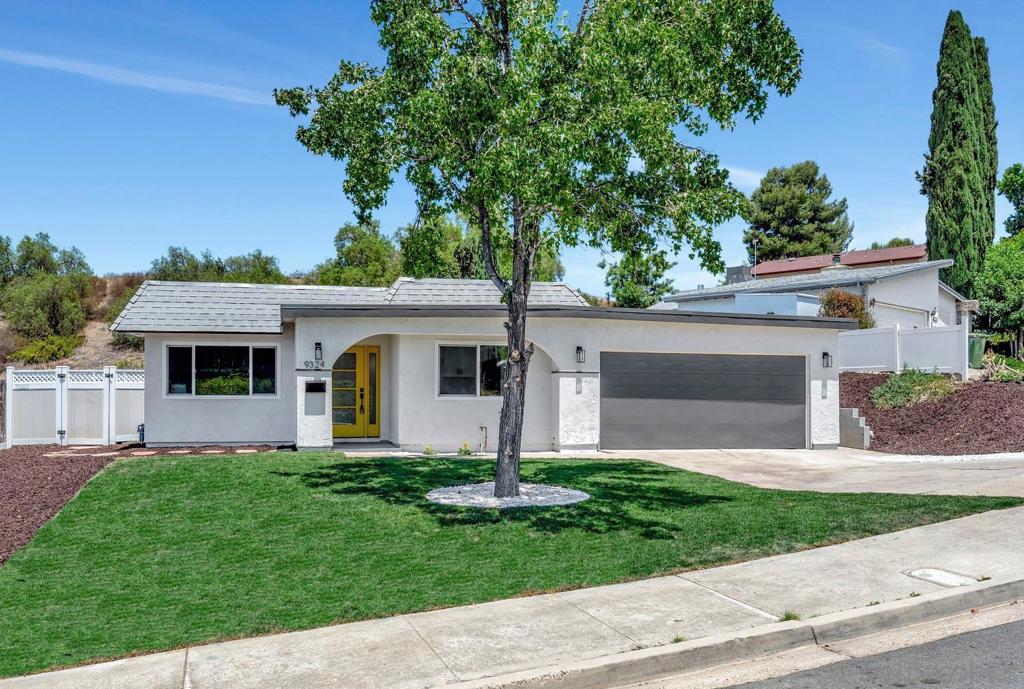 Discover ultimate privacy and modern comfort in this completely remodeled 4-bedroom, 2-bath retreat. The property is nestled at the edge of pristine open land with views of the surrounding hills, and yet is just a short stroll from the scenic Santee Lakes. The designer kitchen impresses with a showstopping waterfall quartz island, bar seating, soft-close cabinetry, and sleek stainless steel appliances. Both bathrooms exude luxury, offering spa-inspired finishes with options for both a refreshing shower and a relaxing soak in the tub. Other highlights include a new furnace and AC, dual pane windows, spacious 2 car garage, and laminate hardwood flooring throughout. Step outside to your private oasis with no rear neighbors, where you can unwind beneath the covered patio or enjoy the expansive fenced backyard, complete with a storage building for tools and gear. Homes of this caliber in such a prime location are seldom available — schedule your showing today before it’s gone!