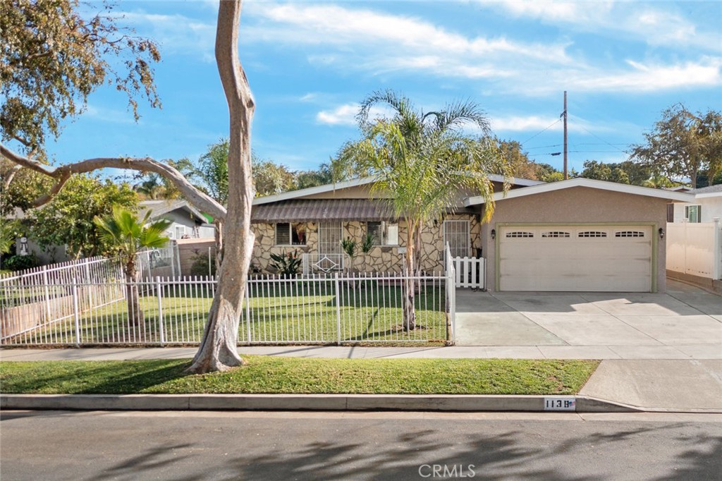 Welcome to this 3 bed, 2 bath home with laminate flooring, tile flooring in bathrooms, formica kitchen counter tops, spacious master bedroom with, 2 car garage, sprinklers on front and back yard. Spacious back yard with fruit trees. The relaxing covered patio for entertainment. Close to shopping centers, dining, schools and the 15 and 91 freeways!