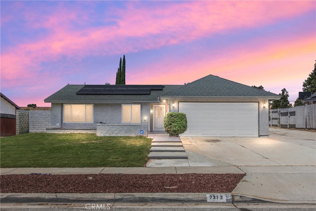 Freshly remodeled and move-in ready, this versatile 6-bedroom, 3-bathroom home offers flexible living combined with a separate attached ADU. The main home includes 4 bedrooms and 2 full bathrooms, while the ADU adds 2 additional bedrooms, a full bath, and its own private entrance — ideal for extended family or guests.
Enter through the front door into a spacious living room with vaulted ceilings and a gas fireplace, creating an open and welcoming feel. This main gathering space flows seamlessly into the dining area and updated kitchen featuring white granite countertops, brand-new cabinetry with dual corner lazy Susans, and added counter and storage space near the dining area. The dining space connects directly to the enclosed rear patio through sliding glass doors, offering an easy indoor-outdoor flow.
Down the hallway are three secondary bedrooms all with ceiling fans, and a shared full bath with a newly tiled shower/tub combo. The primary suite sits at the rear of the home and includes an extended closet, ceiling fan, sliding door access to the yard, and a private bath with a tiled walk-in shower and updated vanity. A whole house fan is also located in the hallway for added ventilation.
The attached ADU has its own kitchen area with cabinet storage, sink, and space for a refrigerator, as well as two bedrooms and a full bath with a walk-in tiled shower. It has a spacious indoor laundry area and private entry via the front porch, in addition to interior access from the main house.
The rear yard is fully fenced and features a large fully enclosed covered patio with new tile flooring and plenty of windows, an additional extended patio cover for added shade, a grassy area, and raised planter beds. RV parking is available along the side of the property.
Additional updates include fresh interior and exterior paint, new vinyl plank and tile flooring throughout, recessed lighting, updated bathrooms, and refreshed landscaping. Commuter friendly and conveniently located to nearby shopping and schools, this property is ready for its next owner!