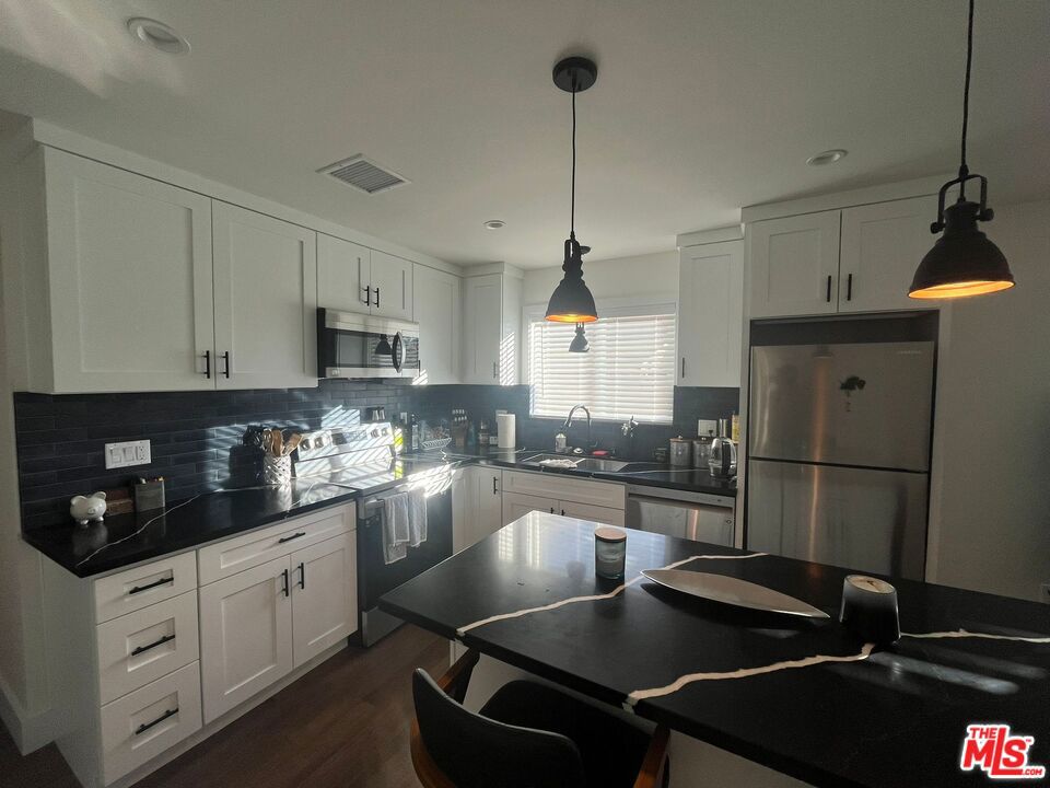 Newly constructed, furnished, 1 bed, 1 bath ADU on a quiet cul-de-sac in Northridge. It is on the same property as another unit, but with your own separate entrance, and your own large private fenced outdoor space! This home includes refrigerator, oven, in unit washer/dryer, microwave, TV, heating and air conditioningsystems, energy efficient windows, and premium fixtures allowing for a completely trouble-free living experience. The unit has its own Electric meter, tenant pays for cable,electric, internet. The owner pays for water. All electric appliances. Minimum 1 year lease. Plenty of street parking.