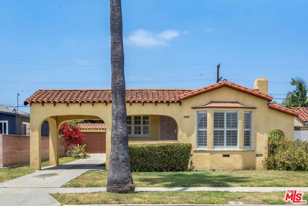 Photo of 3785 Degnan Boulevard, Los Angeles, CA 90018 (MLS # 26853299)