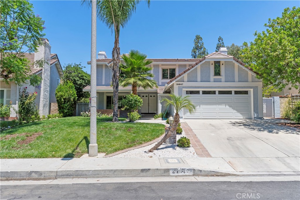 Welcome to this beautifully renovated residence in the highly sought-after Castle Peak Estates, where modern comfort meets timeless charm. Thoughtfully upgraded and meticulously maintained, this home offers an exceptional lifestyle on a spacious near 8,000 ft. lot—ideal for entertaining, gardening, or simply enjoying the California outdoors. This two-story home boasts approximately almost 2,500 sq. ft. of well-designed living space, featuring four generously sized bedrooms and three tastefully updated bathrooms. The recent renovations blend sophistication with functionality, showcasing updated flooring, stylish lighting, and refreshed finishes throughout. The upgraded kitchen is both elegant and efficient, catering to the needs of today’s culinary enthusiasts with quality materials and smart design. Unlike some of the larger models in Castle Peak Estates, this home offers a more manageable footprint without sacrificing flow, comfort, or style. It has a two-car garage and is surrounded by attractive landscaping that adds to its charm. The brand-new custom deck and sweeping views create a serene, low-maintenance outdoor retreat perfect for hosting guests or enjoying peaceful evenings under the sky. Set within the acclaimed Las Virgenes School District, the home is located near scenic parks, recreational fields, and top-rated schools, as well as premier shopping and dining destinations such as The Commons and Westfield Malls. With easy freeway access and a quiet, residential setting, the location offers a perfect balance of convenience and tranquility. Move-in ready and thoughtfully appointed, this property is a rare opportunity for those seeking a stylish, updated home with generous living areas, a spacious lot, and captivating outdoor charm. Whether you're looking to simplify or to expand in the future, the backyard offers ample room for a pool, and spa. This home checks all the boxes for comfortable, refined West Valley living.