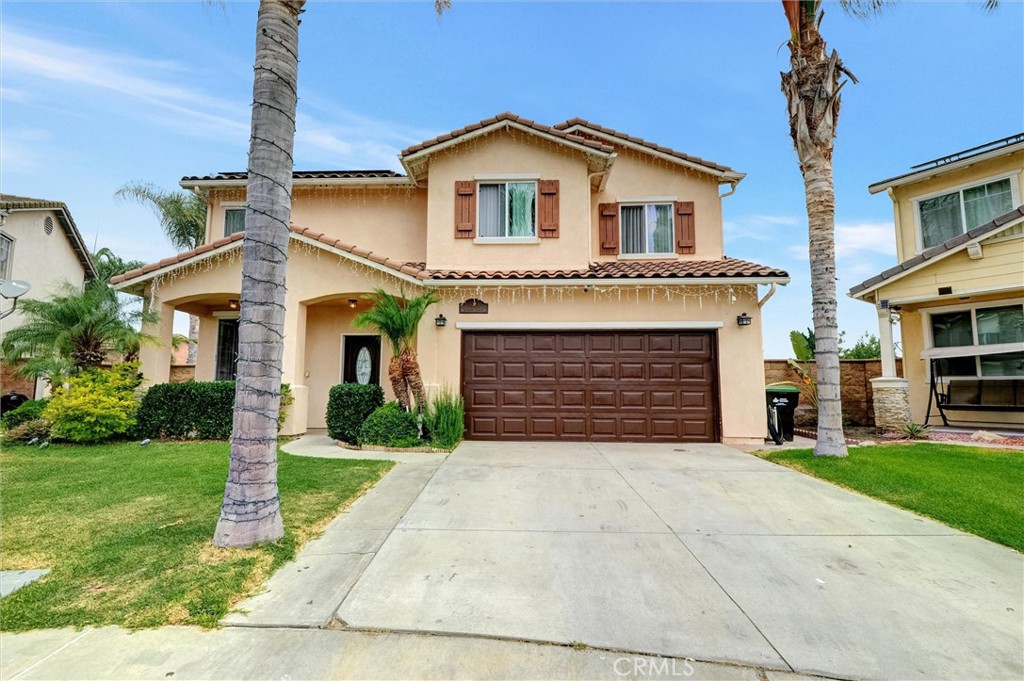 Welcome to your dream home in the heart of Avocado Heights at the end of a quiet cul-de-sac. This is a stunning two-story residence with 4 bedrooms and 2.5 beautifully updated bathrooms. Built in a newer community, this home has been thoughtfully upgraded throughout with quality finishes.
Step inside to find tile floors downstairs and rich wood flooring upstairs, accentuated by a stylish two-tone staircase and elegant crown moulding throughout, including detailed moulding around windows. The kitchen features white shaker cabinets, quartz countertops, a decorative backsplash, stainless steel appliances, a convenient pantry, and plenty of natural light. Enjoy meals under a stunning chandelier in the dining area.
The primary suite offers a walk-in closet and a spa-inspired walk-in shower. All bedrooms are equipped with ceiling fans. Additionally the home features recessed lighting that enhances the bright and airy ambiance of every space.
Step through the sliding glass door to your private backyard oasis—perfect for entertaining! Relax under the covered patio or unwind in the sparkling pool and spa.
Energy efficiency is a plus with owner-owned solar panels The attached garage has epoxy floors and custom cabinetry for extra storage and convenience.
Don't miss this rare opportunity to own a move-in ready, upgraded home in Avocado Heights. Contact me now