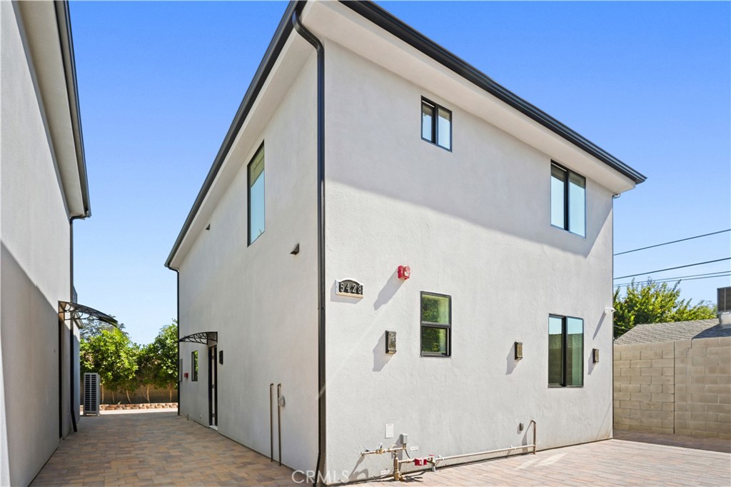 Location! Location! Location! Welcome to this stunning newly built 3 bedroom and 2 bathroom backhouse for rent in Sherman Oaks! Be the first one to live in this beautiful and stylish modern new construction 2-story home! The spacious and open floor plans include a large living room and kitchen which flow together with a sliding door taking you to the backyard. Stylish kitchen features huge island, stainless steel appliances and quartz countertops. Bright and specious bedrooms feature lots of storage. Additional features include washer/dryer, central HVAC, backyard, 3 parking spaces and gated entry. Must see!