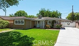 Photo of 1408 W Avenue H14, Lancaster, CA 93534 (MLS # PW26200403)