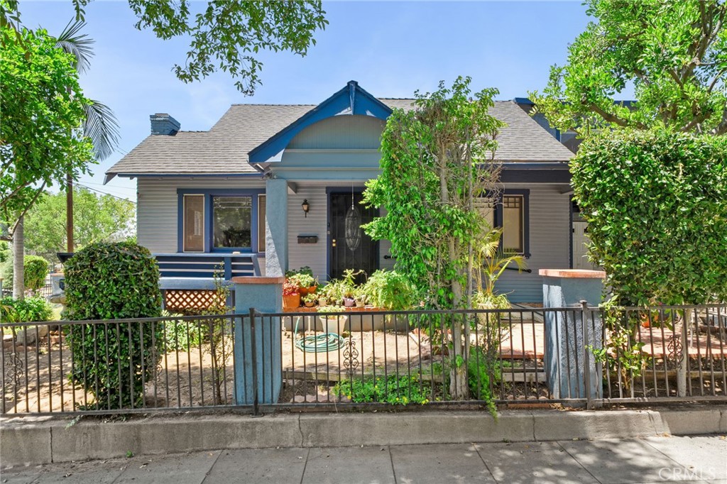 On the market for the first time in 50 years! This one of a kind gem nestled in the Historic Highlands neighborhood of Pasadena is ready for its next generation of ownership ~ This 4-bedrooms, 2-bath Bungalow has over 1,600sqft of living space, and offers both modern and original features blending in the classic and contemporary ~ Living room with hardwood flooring and a fireplace with what appears to be original a 'Batchelder Tile' face ~ Formal dining area with natural light coming through ~ A beautiful and modern chef's kitchen with center island with barstools, stove, and curved glass range hood, make this area the center of all entertainment and gatherings ~ Main floor offers two secondary bedrooms and a bathroom ~ Unique feature to this home is that it has the POTENTIAL FOR JR ADU (check with city) where you can have two families live separately by utilizing the two upstairs bedrooms and bathroom with a separate access in the hallway ~ Laundry hookups in garage ~ 1-Car attached garage with direct access with roll-up garage door & lots of storage ~ Carport at exterior of driveway ~ Front porch area with ramp for accessibility ~ Low maintenance yard ~ Side yard perfect for pets, kids, and sunbathing ~ Close to shopping ~ Lots of potential with this home ~ A true gem of Pasadena and a must see!