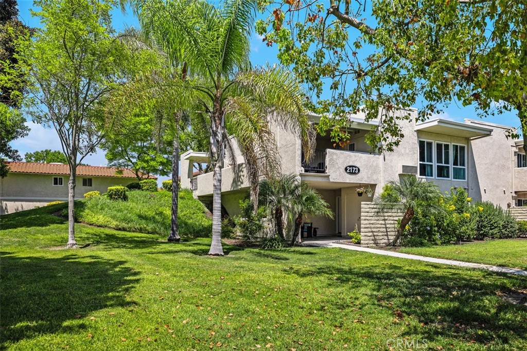 REMODELED & READY to Move In. 2 bedrooms, 2 bathrooms, NO STAIRS, with Central Heat & AC. Walk right in from the large gated covered patio, enter the living room with flat screen TV mounted above an electric fireplace, where the kitchen has been opened up and remodeled with stainless appliance, newer cabinets and quartz counter tops. Large skylights in the kitchen and bathrooms provide a light & bright environment you will love to cook in. Dual pane windows provide year around comfort. Laminate floors for easy cleaning, crown molding, modern smooth ceilings all within this rental. Carport is nearby with storage cabinet. Come and make your home here in this premier 55+ community of Laguna Woods. 7 clubhouses, 5 swimming pools, 27-hole golf course, 9-hole executive golf course, tennis courts, pickleball, lawn bowling 2 fitness centers and much much more!