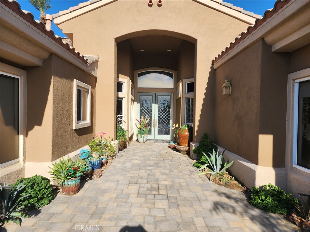 Discover comfort, style, and endless possibilities in this beautifully upgraded Palm Desert home, offered as-is with the option to include furnishings and appliances (with just a few exceptions). Perfectly blending modern updates with resort-style living, this property is designed for both relaxation and entertainment.
Step inside and enjoy the spacious open layout enhanced with new tile flooring, new carpeting, upgraded bathrooms, and designer lighting throughout. The chef’s kitchen is a showstopper with new cabinets, countertops with a stunning marble waterfall breakfast bar, and top-of-the-line appliances.
Unwind in the inviting den with a cozy fireplace, or retreat to the primary suite featuring its own fireplace, new windows and slider, and direct access to the backyard.
For entertainment lovers, the home boasts a rec room conversion with a built-in saltwater aquarium, plus a 102” big screen with surround sound—perfect for movie nights or game day.
Step outside and be greeted by a new gated entrance, paver driveway, and walkways that set the tone for a grand arrival. Even more exciting, the property includes approved plans for a brand-new pool, giving you the opportunity to create the ultimate desert retreat.
With modern upgrades, thoughtful details, and the option to purchase fully furnished, this Palm Desert home is ready for its next chapter
Additional upgrades include:
• New solar system
• New driveway with 3,000 sq. ft. of pavers
• New kitchen appliances, cabinets & countertops with marble waterfall breakfast counter
• Rec room conversion with saltwater aquarium
• Fireplaces in den & primary bedroom
• New tile flooring & carpeting
• New windows & slider in primary
• Upgraded bathrooms
• New lighting throughout
• 102” big screen with surround sound
• Approved pool plans
.