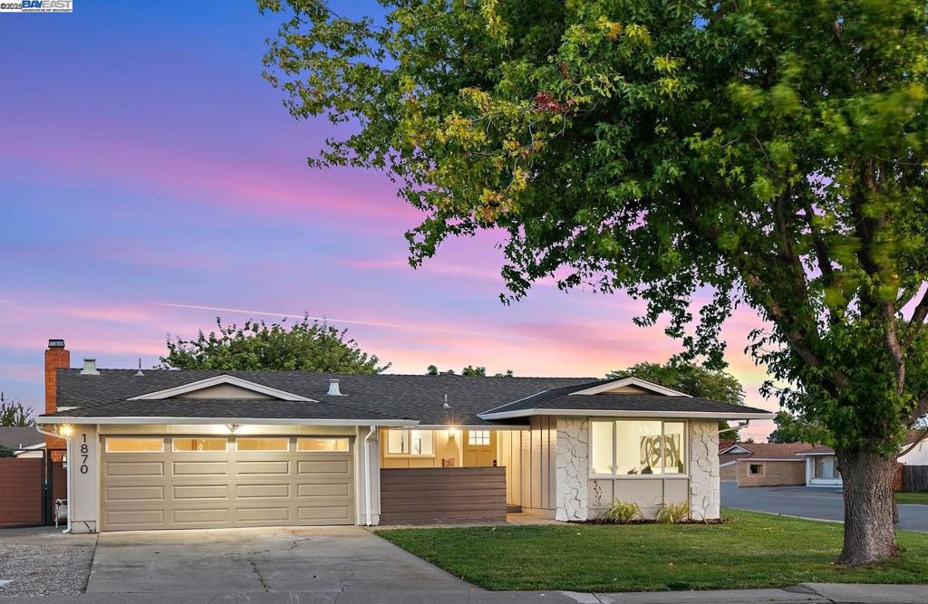 Opportunity to own one of the largest corner lots in this neighborhood with a beautifully updated interior! This home features a spacious, light-filled living room and a separate family room with a cozy fireplace and a glass sliding door to the backyard, enhancing the home with natural light. The heart of the home, a fully renovated kitchen with a custom island, is ready for all your culinary adventures, featuring new cabinets, quartz countertops and stainless steel appliances, including a gas stove. Both bathrooms have been tastefully updated with new vanity sets, light fixtures and an upgraded shower/tub! Outdoors, the expansive backyard has been refreshed with updated landscaping and includes a brand new deck — the perfect spot to relax and host family and friends. The large corner lot also provides convenient parking access through the side gate, adding extra versatility. Ideally located near I-880, Highway 84, BART, Union City Library, Shorty Garcia Park and local schools, this home combines style, comfort and convenience in one package. Come check it out!