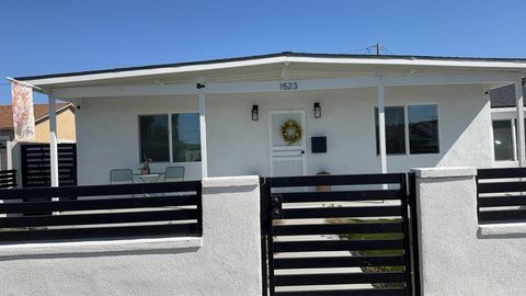 Photo of 1523 E 126th St, Compton, CA 90222 (MLS # DW26068373)