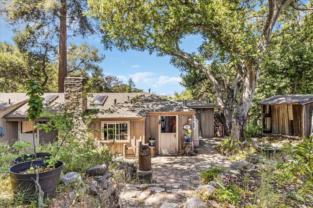 Charming Carmel Valley Retreat Perfectly Nestled Among Nature. Discover this enchanting two-bedroom, one-bath home nestled in the serene beauty of Carmel Valley. Set on a single-level layout, this charming residence offers a peaceful escape surrounded by lush trees and natures tranquility. Perfectly designed for both comfort and growth, it provides ample space to create your dream home or a peaceful retreat. Enjoy privacy and seclusion while being just minutes from the vibrant Carmel Valley Village, renowned for its boutique wineries, charming shops, and exquisite dining. Whether you're seeking a weekend getaway or a permanent sanctuary, this property combines natural beauty, privacy, and convenient access to all that Carmel Valley has to offer. Don't miss the opportunity to make this delightful property your own a true haven in one of California's most picturesque regions.