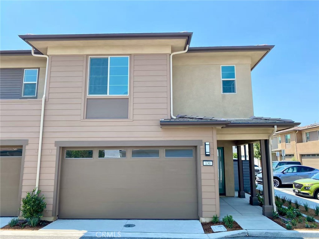 Brand-new 3-bedroom, 2.5-bath home in the sought-after Juniper neighborhood of Rienda, Rancho Mission Viejo. This turnkey residence features wood flooring throughout, a spacious quartz-topped kitchen with a center island, and an attached 2-car garage with a vaulted ceiling. The backyard offers southern exposure and park views, perfect for enjoying the California sunshine. Enjoy resort-style HOA amenities including a pool, spa, clubhouse, gym, and community pond. Conveniently located near parks, walking trails, and the planned K–8 school. Available for immediate move-in.
