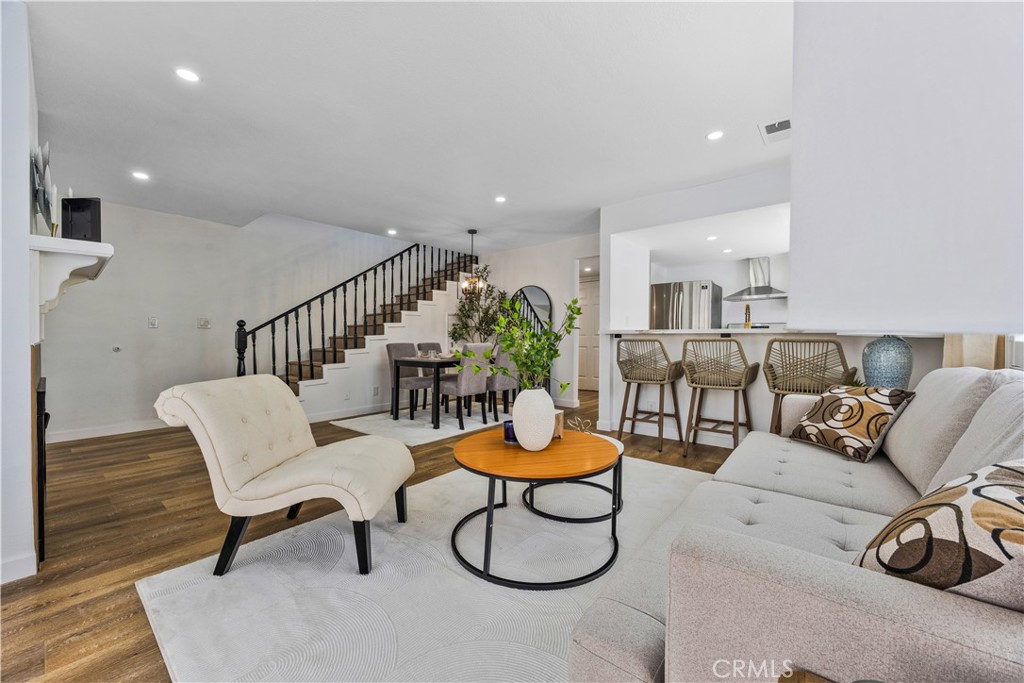 Welcome to this charming 3-bedroom, 3-bathroom condo located at 1126 W. 228th Street, Unit #16, in Torrance. Offering 1,362 sq. ft. of well-appointed living space, this home features a spacious floor plan with a blend of comfort and style. The main level includes wood laminate and tile flooring throughout, with a cozy and inviting living room that leads to a private patio—perfect for relaxation or outdoor entertaining. The kitchen boasts ceramic tile countertops, and there's a convenient guest bathroom on the main floor. Upstairs, you'll find the spacious master suite complete with its own private bath. The additional two bedrooms are also generously sized and share a full bathroom. Enjoy the added convenience of a direct-access 2-car garage, providing plenty of storage and easy entry into the home. Community amenities include a sparkling pool and spa, ideal for enjoying sunny days. This well-maintained condo is located in a prime Torrance location, offering easy access to shopping, dining, parks, and schools. Don’t miss out on this fantastic opportunity—schedule a showing today!