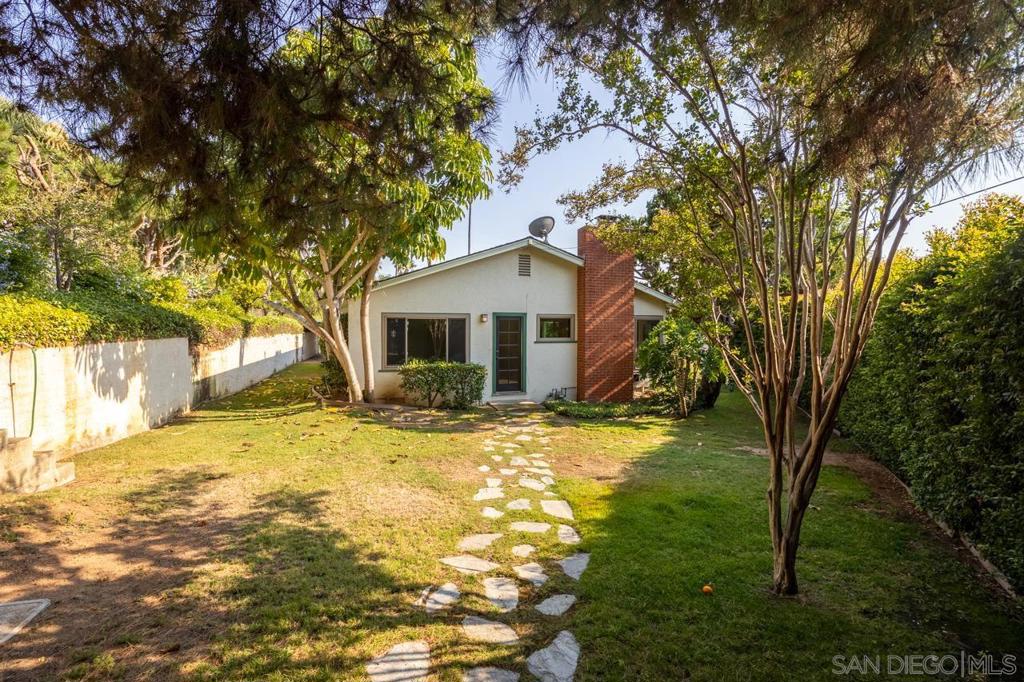 This classic single level ranch-style Mt. Helix home is on a spectacular corner lot! Pride of ownership is evident in every square inch of this property. The beautifully landscaped yard includes orange, lime, pear, lemon, avocado trees and jasmine, a full fence and 8-foot tall hedges for privacy. The covered front porch provides the perfect area to enjoy your morning coffee or evening sunsets. Inside, you'll find beautifully maintained hardwood floors, newer dual paned windows and blinds, stainless appliances. Large windows fill the house with natural light and offer views of the outdoors while still maintaining your privacy. Recent upgrades include an updated electrical panel (solar ready) and newer HVAC oversized 2 car garage with tall ceilings, RV/Boat parking spaces. Large windows fill the house with natural light and offer views of the outdoors while still maintaining your privacy. Recent upgrades include an updated electrical panel (solar ready) and newer HVAC oversized 2 car garage with tall ceilings, RV/Boat parking spaces
