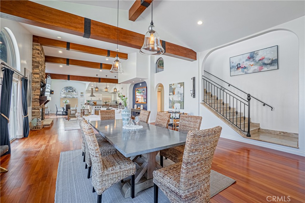 Welcome to this beautiful Coastal Mediterranean home just 2 blocks to the beach with ocean views and 3684 sq ft of living space. Built in 2007 (partial remodel in 2014 and recent kitchen update) featuring 4 bds, 3.5 ba, temp controlled 500+ bottle wine room. With a great room concept this home is wide open with hardwood and stone floors, high wood beamed ceilings and lots of light. The great room has flexibility for a formal dining space, lounging area etc. The family room features a floor to ceiling stacked stone gas fireplace with raised hearth and wood mantle. The large open kitchen has lots of custom wood cabinetry, soft close doors/drawers, walk in pantry, SS appliances including a 5 burner gas cooktop, new convection oven and new refrigerator. A breakfast area with large window showcasing backyard waterfall feature. 1st floor has 3 generous size bdrms, 2.5 ba (1 ensuite). Laundry rm, understair storage and the beautiful wine rm complete 1st floor. Upstairs is spacious primary suite with a cozy fireplace & 3 walk in closets. Escape to the ensuite for a soak in the large Jetta tub or opt for the walk in steam shower with 2 shower heads & 4 body sprays for a true spa experience. His/hers sinks and toilet room. The lg bonus rm comes with 2 tv's for gaming, movies, or multi sports viewing. Step out to the balcony for sun bathing, ocean views, & sunsets. The front patio is perfect for entertaining, dining, BBQ and lounging by the fire and enclosed for privacy. 2 car garage with electric car charger and whole house filtration system, and overhead storage. Other features include: Outdoor shower, extra outdoor storage, alarm system, ring cameras, Ecobee smart thermostat, smart home locks and 7 mounted TV's stay with home. You're only a short stroll to Riviera Village with many shops, restaurants, services and weekly farmers market. The Village hosts many fun festivities and holiday events making this such a wonderful place to live. Just 2 miles between each pier by beach strand makes for fun biking to Hermosa and Manhattan for all the events, beach concerts, volleyball and surfing tournaments, and wide array of restaurants and shops to explore. Just 25 min to Lax, 25 min to Sofi, and 30-40 min to Crypto arena. This is the best of beach living!! Conveniences of bigger city with a small town feel waiting for you to call it home.