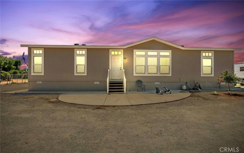 Seaton property is a newer move in ready manufactured home with incredible features. This three bedroom beauty is in great condition and has everything you need. Every room has its own walk in closet. It features a spacious open concept floor plan that flows seamlessly into the kitchen, making it perfect for comfortable living.
Not only does this space have a fantastic layout, but it also has a large hidden walk-in pantry and an indoor laundry room, adding to its functionality and convenience. I think you'll love the way this space feels - it is perfect for relaxing alone or hosting friends and family. This home also has a huge patio for family family gatherings. Not to mention, it sits on a little under an acre of flat, usable land - plenty of room for animals, toys, RV, or even a couple of ADUs. Currently zoned RR, this home has endless possibilities. But here's the kicker - this home is right in the middle of up and coming industrial buildings. It's a great buy for a developer or industrial developer looking to capitalize on this prime location. Don't miss out on this rare find!