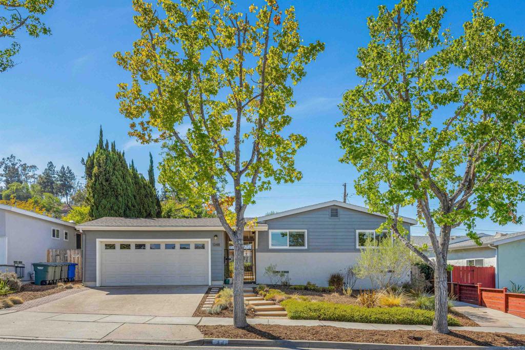 Welcome to this beautifully remodeled, move-in ready home, located in a warm and inviting neighborhood known for its true "down-home" charm and strong sense of community. As you enter through the secure breezeway, you'll find a spacious detached two-car garage with ample storage. Step inside and you’re greeted by original, refinished hardwood floors, newer dual-pane windows, and a sliding glass door that fills the living room with natural light. Solar tubes throughout the home bring in soft, warm daylight, enhancing the bright and welcoming atmosphere. The fully renovated kitchen features modern finishes and thoughtful upgrades, ideal for both daily living and entertaining. Neutral paint tones flow throughout the home, complementing the updated bathrooms and convenient indoor laundry area. Stay cool during the warmer months with central A/C. Enjoy outdoor living in the cozy backyard and patio—ideal for relaxing or hosting guests. This neighborhood is more than just a place to live—it's a place to belong. For over 50 years, the community has proudly hosted an annual 4th of July parade, along with cherished traditions such as a neighborhood-wide garage sale, Halloween festivities, and a holiday decorating contest. If you're looking for a home where you can truly feel part of something special, this is it. Schedule your showing today and make it yours!