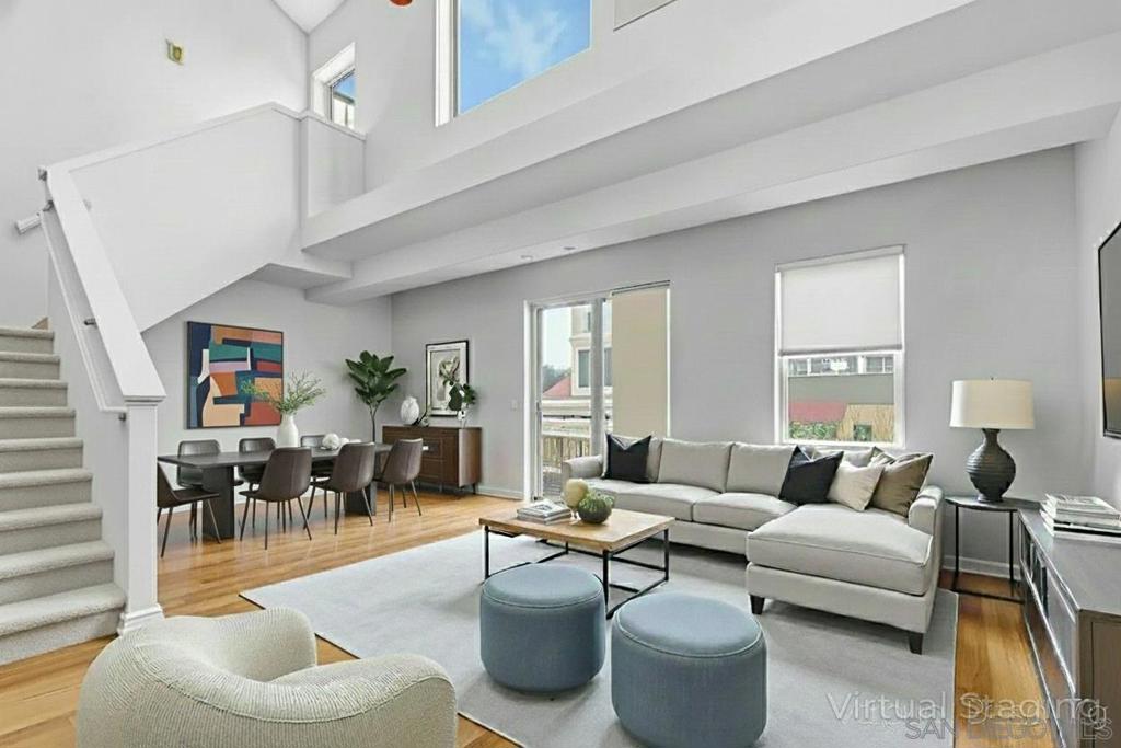 Super prime location! Top floor expansive loft style one bedroom with large custom closet and additional flex space on the main level for home office / guests! Beautifully located within Village Walk in the dynamic culturally rich neighborhood of Little Italy with an easterly cosmopolitan view offering the serenity one can only wish for. Soaring 20' ceilings with fabulous natural light throughout, hardwood flooring and tile on the main level, dual view terraces, and an expansive cook's kitchen with pantry. The best of San Diego is virtually at your doorstep from amazing restaurants and coffee houses to nearby San Diego harborfront, San Diego Int’l, downtown, world famous San Diego Zoo and historic Balboa Park.