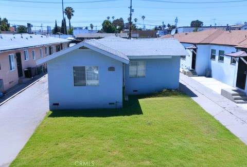 Photo of 6409 11th Avenue, Los Angeles, CA 90043 (MLS # DW26123538)