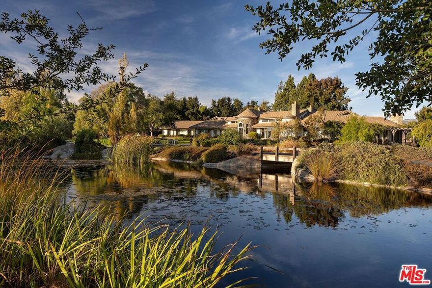 Welcome to Travelers' Farm - a rare and remarkable 116-acre estate in the prestigious Happy Canyon AVA, where world-class vineyards converge with equestrian tradition and timeless design in one unforgettable setting. At the heart of the property sits a gracious approximately 6900 square foot main residence, blending classic proportions with refined finishes: French oak floors, Calcutta Gold marble, a custom ordered La Cornue Chateau French Oven, custom cabinetry throughout, a gorgeous walk-in pantry, and spacious kitchen with an unmatched view of the Santa Ynez Mountains. A richly paneled office or study makes working from home easy and a well-appointed wine cellar awaits the wine enthusiast. Thoughtful extras like a dedicated gym and four-car garage enhance day-to-day living. Surrounding the home, a full outdoor lifestyle unfolds. A sparkling pool and spa, chef- worthy outdoor kitchen, championship-sized tennis court, and beautifully manicured landscaping offer resort-style living, all framed by sweeping mountain views and complete privacy. For equestrian enthusiasts, the property delivers on every front. From the impressive, gated entry, a drive passes through lush, irrigated pastures to high-level training and boarding facilities. These include a professional eight-stall barn with an office, employee lounge, one full bath, two half baths, kitchenette, wash racks, and tack rooms. Additional features include two barns (perfect for conversion to car storage or additional garage space), a 300 by 150 foot working arena with roping setup, covered round pen, hot walker, and expansive trailer parking. The charming manager's house has been fully renovated and offers a comfortable living area and kitchen plus four bedrooms, two and half baths, two-car garage and private setting near the equestrian center. For those dreaming of vines, approximately 40 plantable acres lie within one of California's most prestigious wine-growing regions known for its red and white Bordeaux varietals. Whether you envision creating a boutique label or simply enjoying the potential of the land, the opportunity is both rare and compelling. Located in the scenic Santa Ynez Valley, just a short drive from Los Olivos and Santa Barbara Airport, Traveler's Farm offers the perfect balance of seclusion and accessibility. Surrounded by vineyards, ranches, and picturesque towns known for their fine dining and charm, this is a place to breathe deeply, live fully, and plant roots for generations to come.