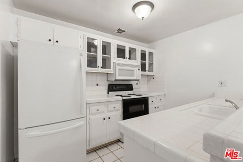 Photo of 5414 Newcastle Avenue #19, Los Angeles, CA 91316 (MLS # 26869315)