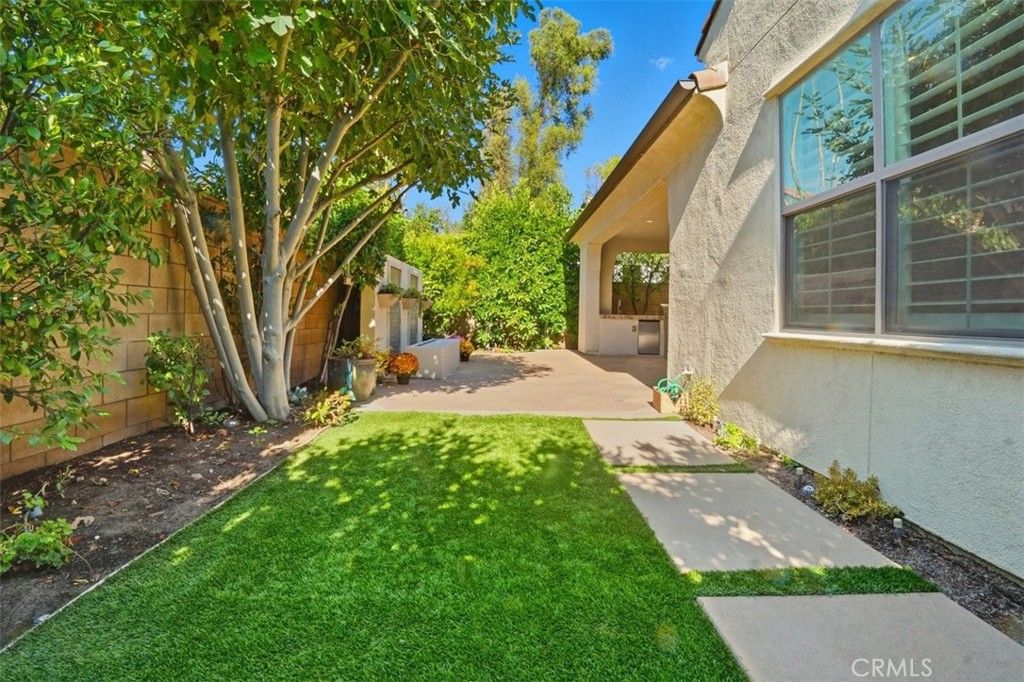 Photo of 65 Rolling Green, Irvine, CA 92620 (MLS # OC25241636)