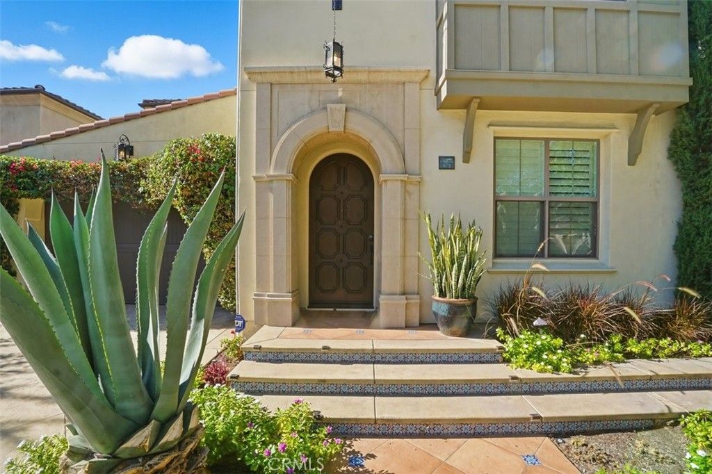 Photo of 65 Rolling Green, Irvine, CA 92620 (MLS # OC25241636)