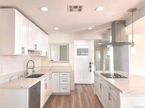 Photo of 4106 Dellwood St St, San Diego, CA 92111 (MLS # 250043591SD)