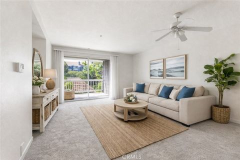 Photo of 20301 Bluffside Cir #D-201, Huntington Beach, CA 92646 (MLS # OC26071551)