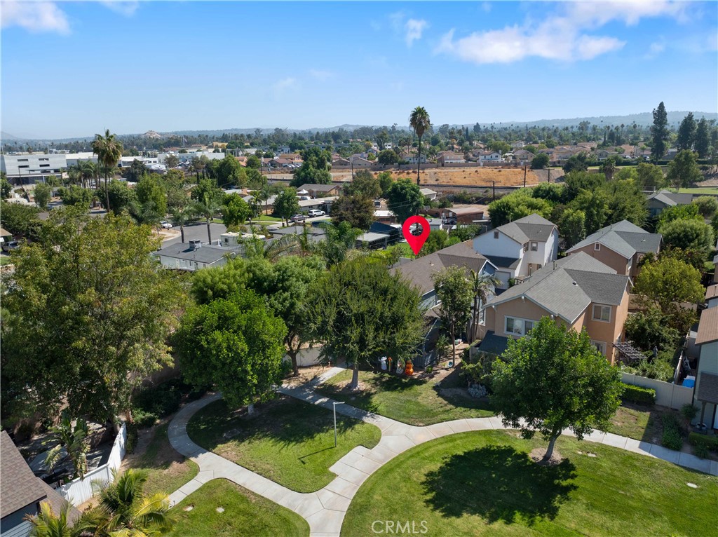 Welcome to the secure, gated community of Village Parks in Riverside—known for its well-kept grounds and peaceful atmosphere. This end-unit home features 4 bedrooms, 2 full bathrooms upstairs, and a convenient half bath on the main floor for guests. The entry opens into a bright, comfortable living area that flows into a functional kitchen complete with granite countertops, a walk-in pantry, breakfast bar, and a spacious dining area. The first floor also includes direct garage access and a side yard entry.
Upstairs, you’ll find all four bedrooms, including a primary suite with a private bathroom featuring a granite countertop vanity, tile flooring, and a generous closet. Three additional bedrooms, a full bathroom, and a separate laundry room round out the upper level. Enjoy your own private courtyard—perfect for weekend BBQs or relaxing outdoors. As an end unit, this home offers extra privacy and is located close to guest parking for added convenience.
Village Parks is a clean, quiet, and safe community, with a beautifully maintained park and playground just a short walk from your door. VERY Low HOA! HOA includes water, trash, and sewer!
Ideally located near California Baptist University, local parks, shopping, dining, and with quick access to the 91 freeway, this home is a smart choice in a great Riverside location.
SELLERS NEED TO MOVE, SUBMIT YOUR BEST OFFER!