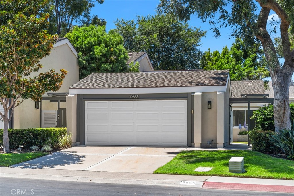 Resort-style beach living at its finest! Fully remodeled in 2022, this single story end unit is an expanded "A" Plan offering a 3rd bedroom/office option with front courtyard access in addition to direct garage access. Enter through the private gated courtyard onto wide oak plank vinyl flooring and into the main living area featuring vaulted ceilings and skylights for an abundance of natural light. The expanded chef’s kitchen includes stainless steel appliances, gas range, shaker style cabinets and marbled quartz counters that extend into the dining room for counter height bar seating. The adjacent family room offers a gas fireplace w/stacked stone and wood mantle and opens to a large private back courtyard. The primary bedroom suite offers sliding door access to the back courtyard, vaulted ceilings w/fan, 2 sets of mirrored double closets, an ensuite bathroom w/marbled quartz double vanities and an oversized walk-in shower. The 2nd bedroom is located in front w/vaulted ceilings and views of the front courtyard. The 3rd bedroom/office is located off of the kitchen and features a skylight, ceiling fan, direct garage access in addition to sliding door access to the front courtyard. The hall bathroom features custom fixtures, designer tile, marbled quartz vanity and a large tub w/shower. The oversized garage includes epoxy flooring, level 2 EV charger w/25ft power cord, washer/dryer, water softener and filtration system, built in cabinets and a pull down ladder for access to add’l storage above. This pet & bike friendly community is centrally located in the heart of downtown, adjacent to top-rated schools, near Pacific City and sandy beaches. Add’l upgrades include a new electrical panel and recessed lighting throughout. This end unit is uniquely located across from the sand volleyball court, newly renovated clubhouses, Jr. Olympic size pool, spa, saunas, additional parking and is surrounded by greenbelts and tree lined walking paths.