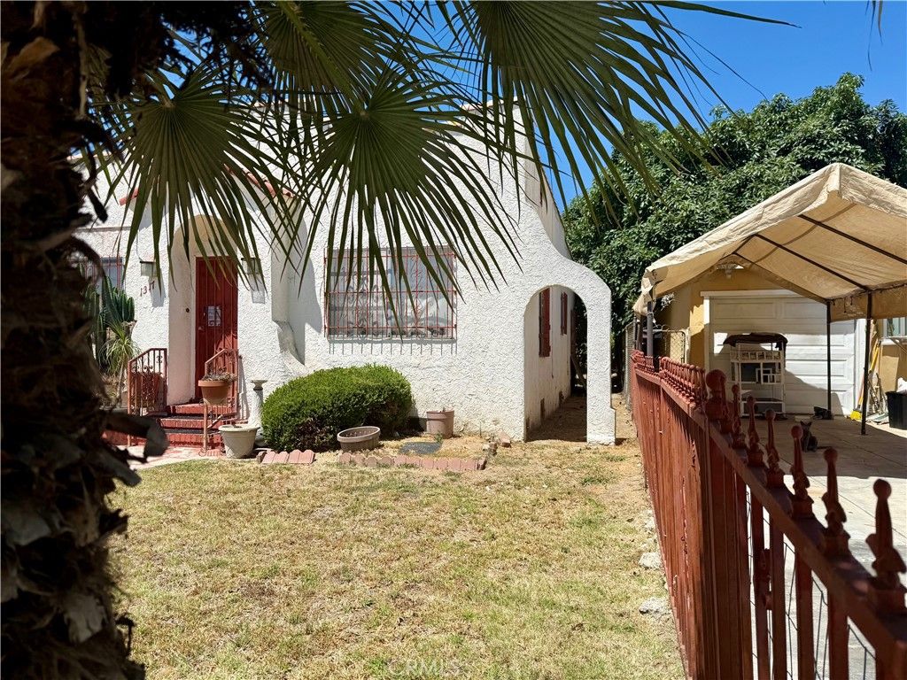 Photo of 1317 S Temple Ave, Compton, CA 90221 (MLS # MB25239789)